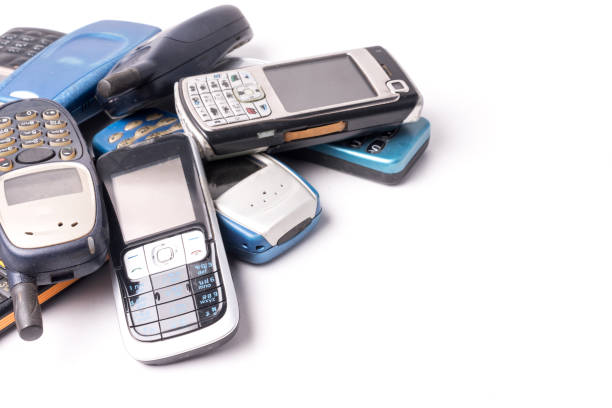 istock old and obsolete cellphone on a white background. Free space for text 847087940
