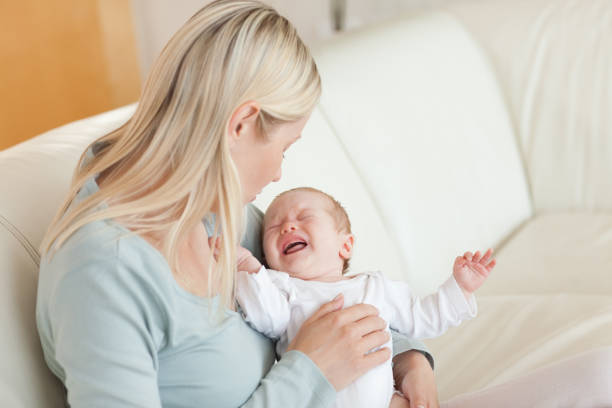 istock Mother trying to calm her baby 847101254
