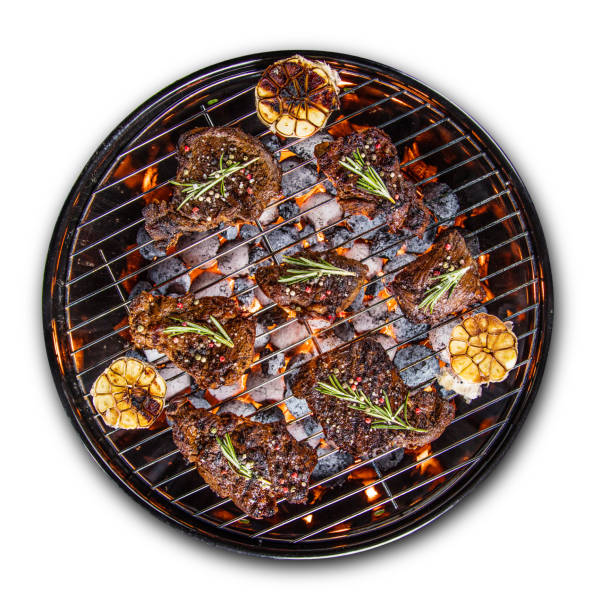 istock Barbecue grill with beef steaks, close-up 847108390