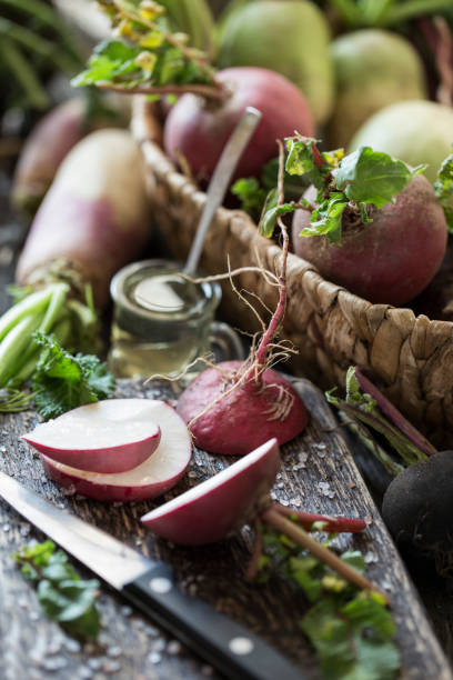 istock root vegetables turnips, radishes, beets on a wooden background 847110672