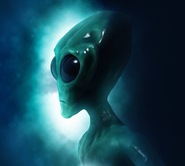 istock Portrait of an alien in dark background. 847116044