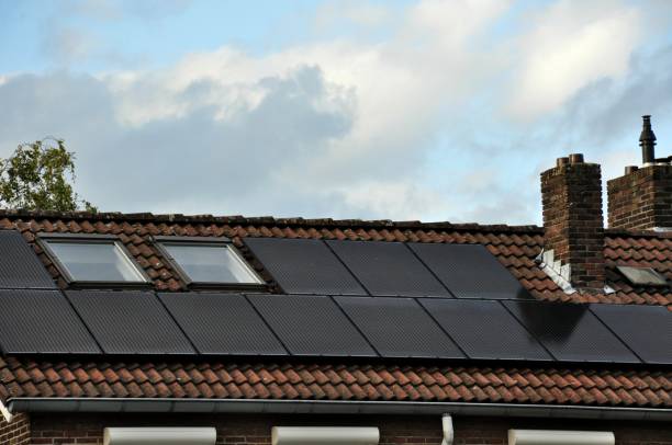istock Rooftop of Dutch Home with Solar Panels and Skylights 847125062
