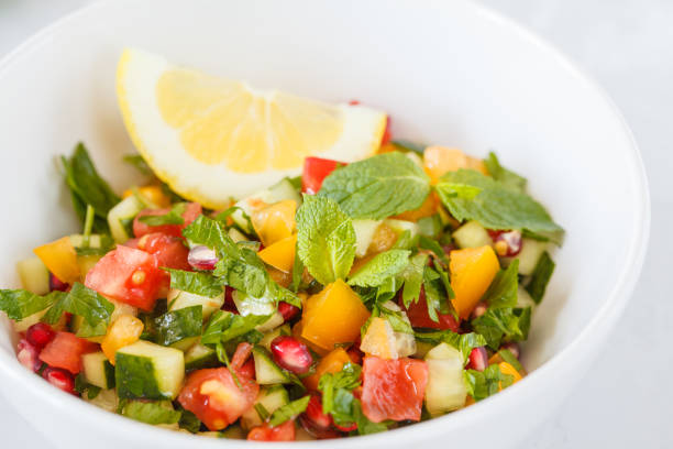 istock salad tabbouleh, rustic concrete background 847125116