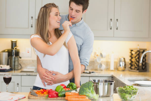 istock Woman feeding man jokingly 847133852