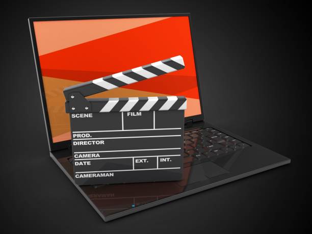 istock 3d laptop computer and film clap 847134510
