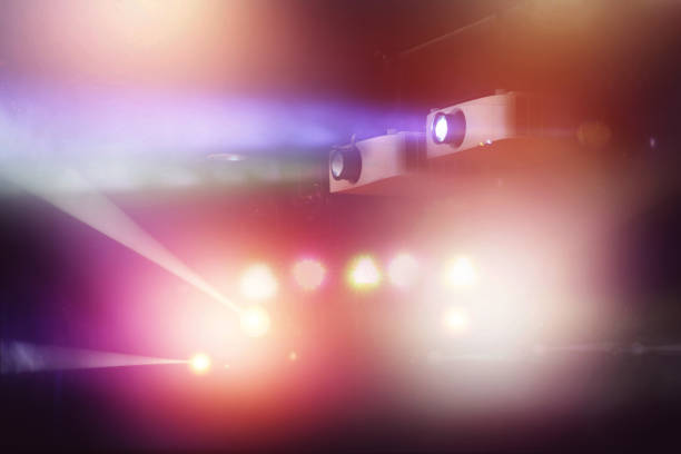 istock video projector in nightclub and colorful light beam 847144448