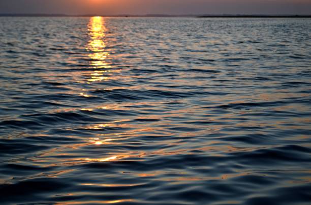 istock nature view with waves and sunshine 847145204