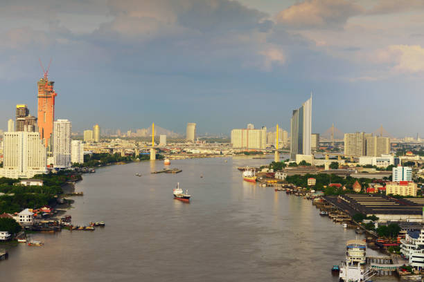istock Downtown Bangkok city at night, Chao Phraya River, Thailand 847148804