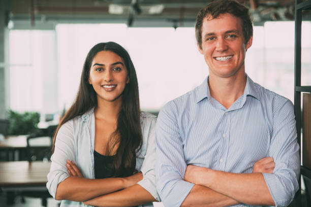 istock Cheerful successful specialists smiling at camera 847152070