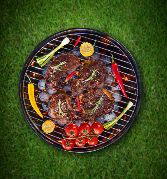 istock Barbecue grill with beef steaks, close-up 847152258