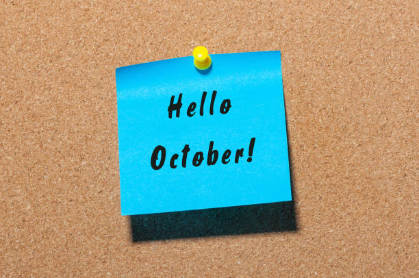istock Hello October written on a sticker at notice board with empty space for text 847152476