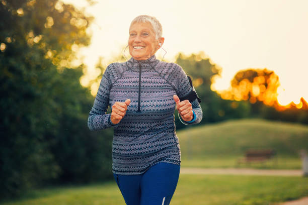istock Senior woman jogging in the park 847152586