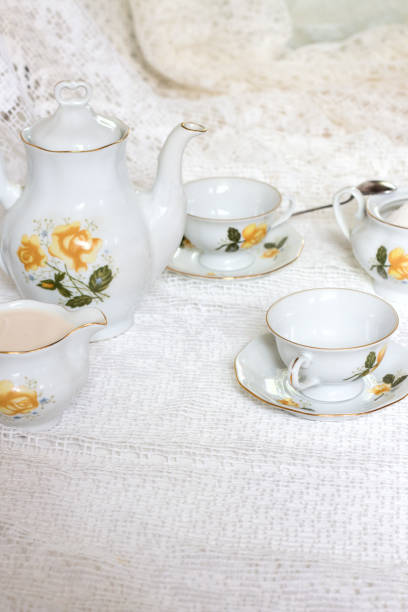 istock Antique tea-set with sugar and milk on white table close-up 847152918