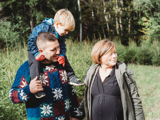 istock Family choosing a Christmas tree together 847153330
