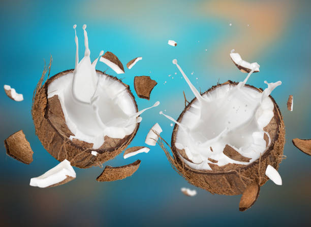 istock close-up of a coconuts with milk splash 847156924