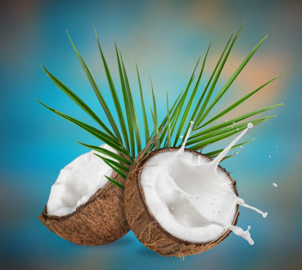 istock close-up of a coconuts with milk splash 847157006