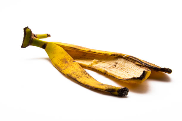 istock A banana skin on white background 847165430