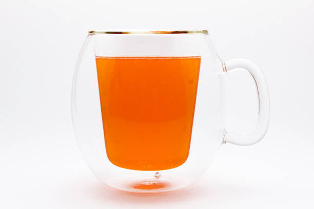 istock A glass of orange soda on a white background 847168150