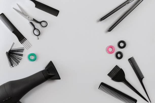 istock Hairdresser set with various accessories on gray background 847168698