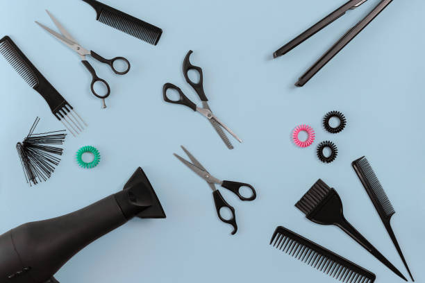 istock Hairdresser set with various accessories on blue background 847168866
