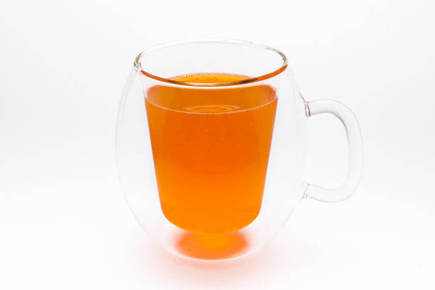 istock A glass of orange soda on a white background 847172042