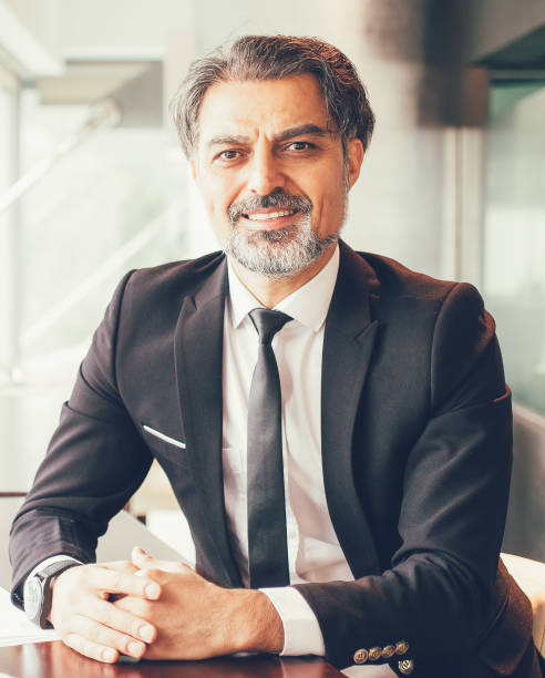 istock Portrait of successful financier at paperwork 847172550