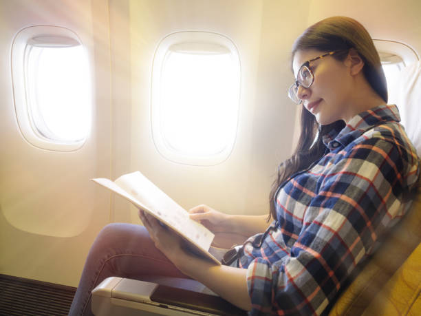 successful business woman taking the airplane