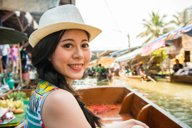 istock woman traveler taking boat visiting Thailand 847175706