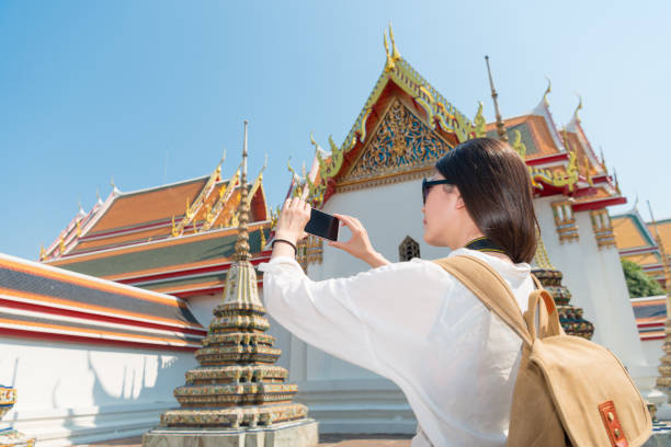 istock happy smiling woman using mobile smartphone 847176178