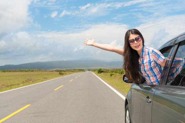 istock woman wearing sunglasses happily make showing 847183632