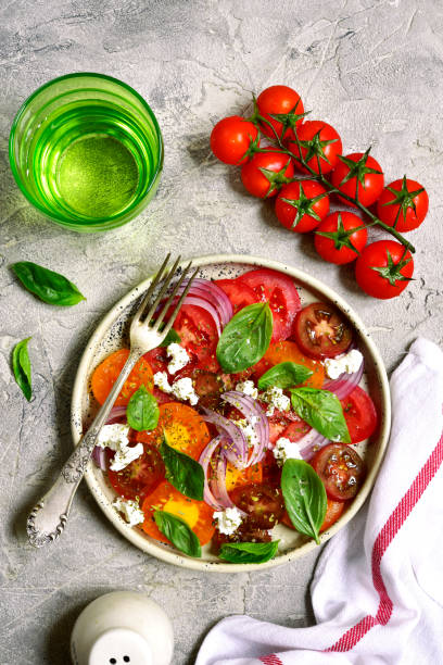 istock Tomato salad with feta cheese 847184046