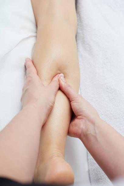 istock Beautiful woman having relaxing massage  in spa salon 847184236