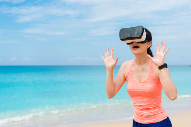 istock beautiful fitness lady using virtual reality 847186610