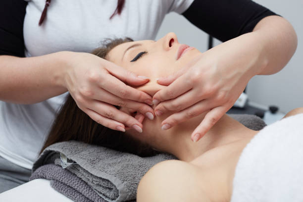 istock Beautiful woman having relaxing massage  in spa salon 847187096
