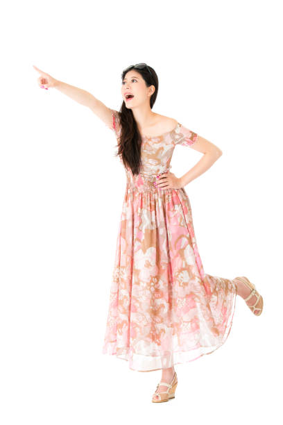 istock happy female student pointing blank area 847187110