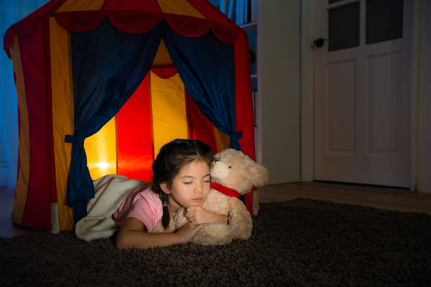 istock sweet beauty kid lying sleeping in children tent 847197352