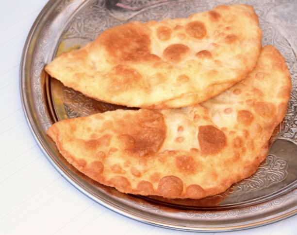 istock Turkish cheese pie fried in oil ( Cig borek ) ( Raw pie or Tatar pie ) 847198166