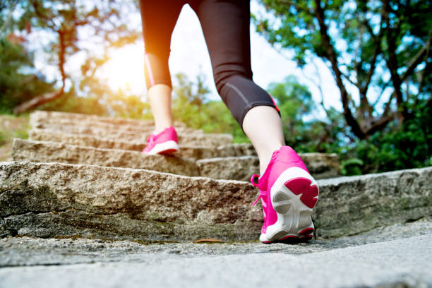 istock Woman feet walking on the steps 847201856