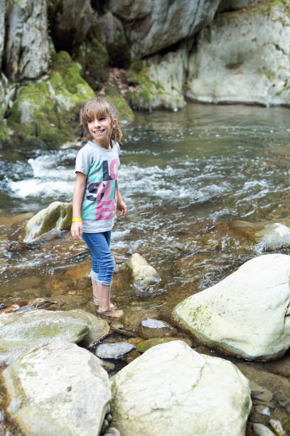 istock Girl next to the Waterfall 847202006
