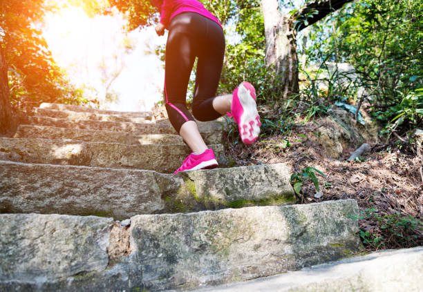 istock Woman feet running on the steps 847202204