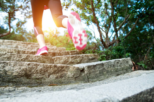 istock Woman feet running on the steps 847202212