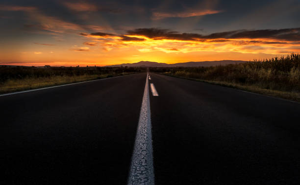 istock Straight road to sunset 847202360