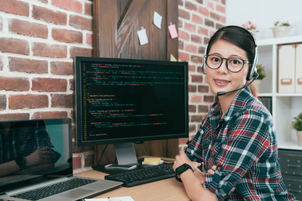 istock smiling confident call center female employee 847207182
