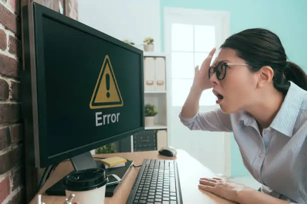 annoyed company manager lady finding office working computer getting mistake problem showing error symbol feeling angry and confused.