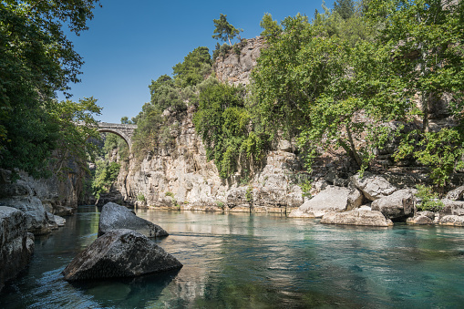 Büğrüm bridge crosses over a stream which joins with Köprüçay (Eurymedon). It is located, 5km south of Olukköprü.