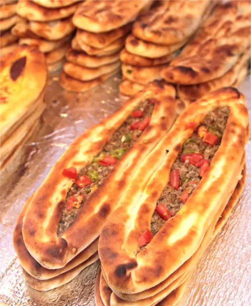 Turkish pizza or meat pita. ( Lahmacun - Etli pide ) close up image