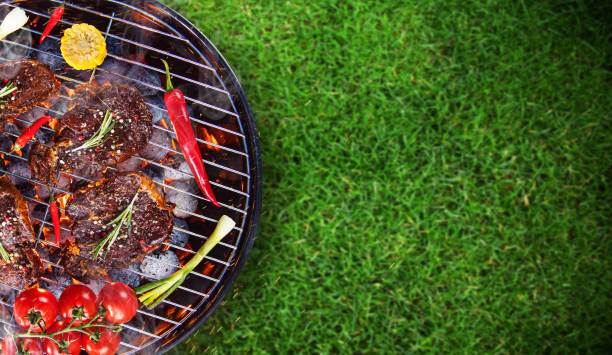istock Barbecue grill with beef steaks, close-up 847213418