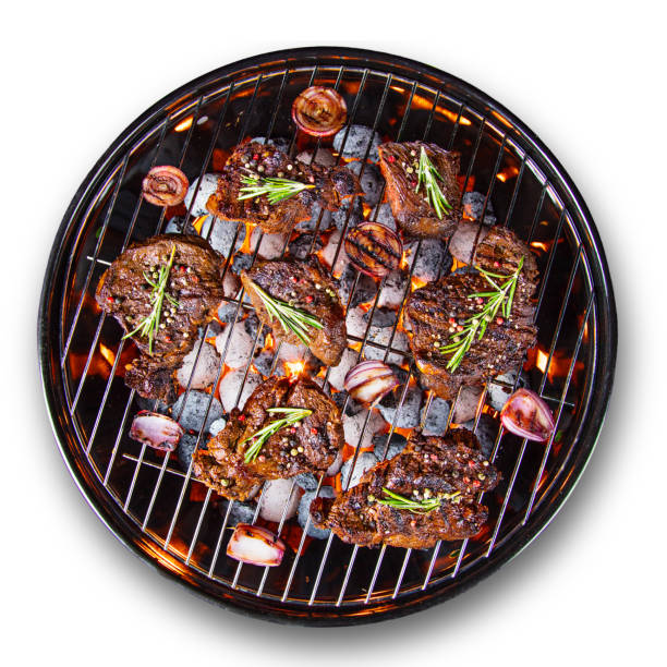 istock Barbecue grill with beef steaks, close-up 847214184