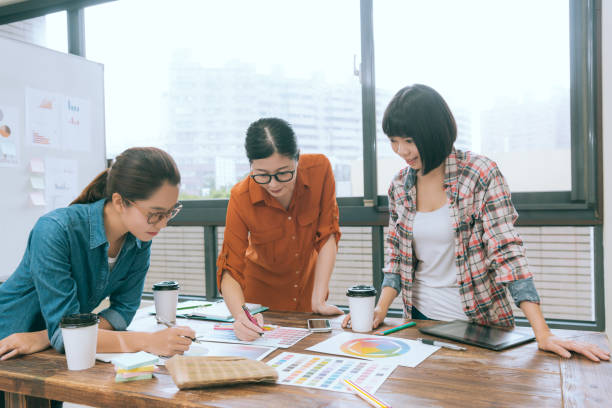 istock elegant attractive female designer team leader 847217556