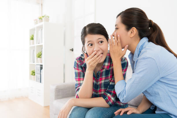 istock girl feeling surprised using hand cover mouth 847218770